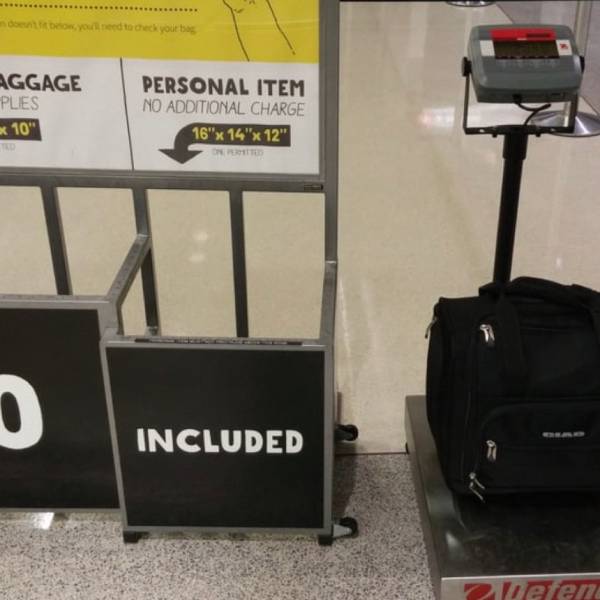 spirit carry on luggage size